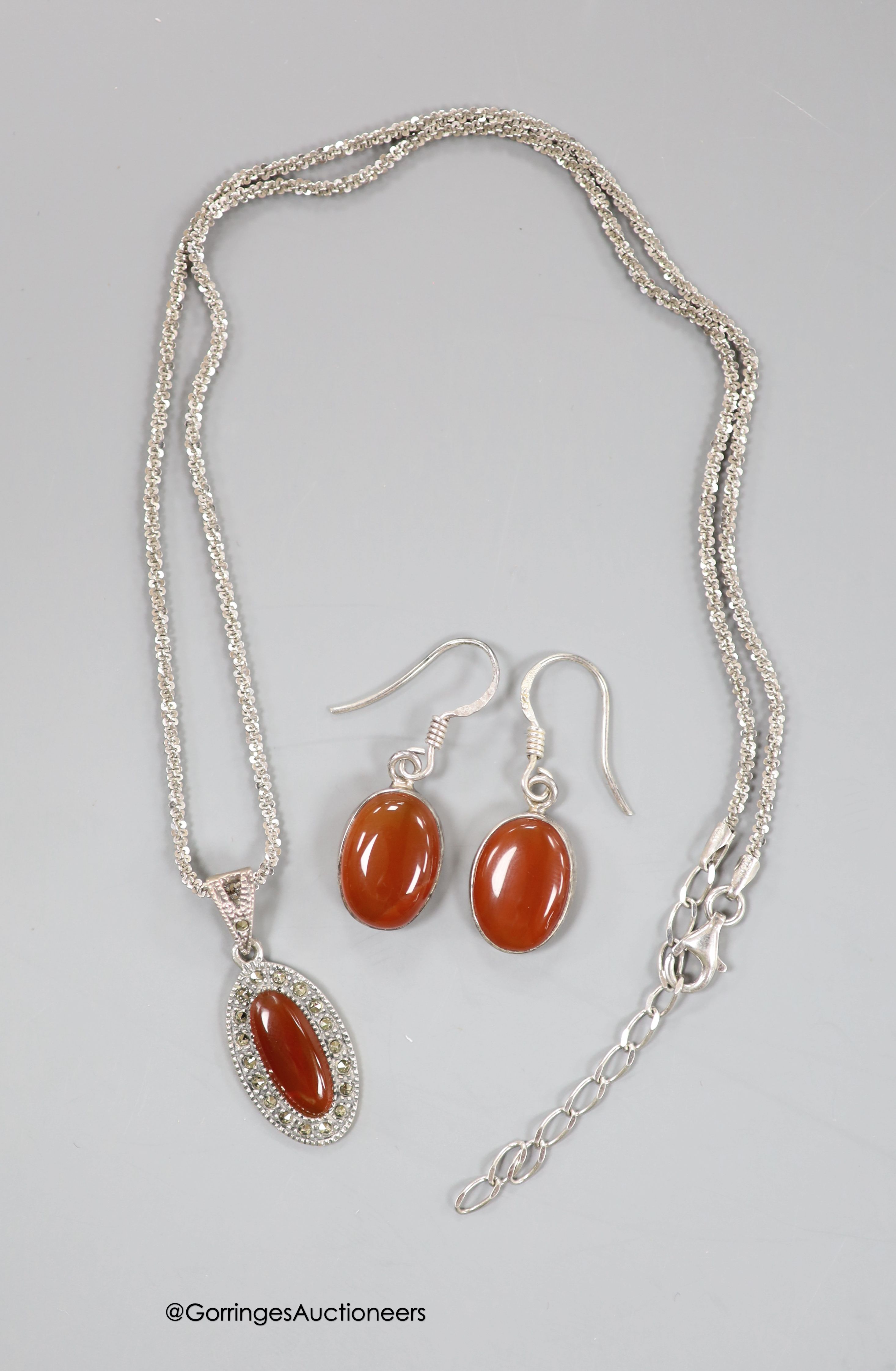A 925, chalcedony and marcasite set necklace and a pair of similar earrings.